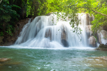 Wonderful green waterfall and nice for relaxation, Breathtaking and amazing turquoise water at the evergreen forest, Located Erawan waterfall Khanchanaburi Province, Thailand