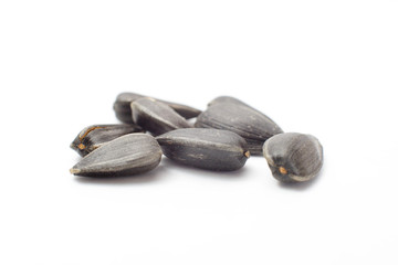 Processed sunflowers seeds isolated on white background with clipping path