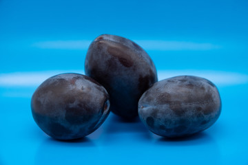 Obraz premium plums on white background
