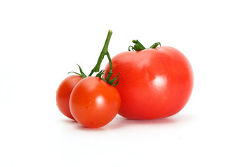 Delicious red tomato cherry on a white background.