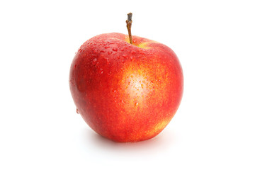Delicious appetizing beautiful fresh red apple isolated on a white background.
