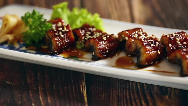 Japanese food: ShuShi, Mix sashimi and ebi served with Japanese cooked rice on table. Clean food concept. Focus shift and movement camera. Selective focus and free space for text.