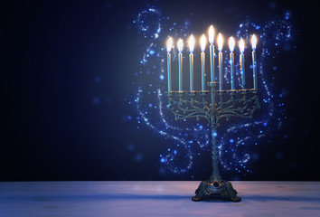 Religion image of jewish holiday Hanukkah background with menorah (traditional candelabra) and...