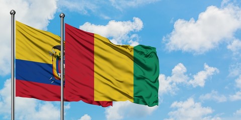 Ecuador and Guinea flag waving in the wind against white cloudy blue sky together. Diplomacy concept, international relations.