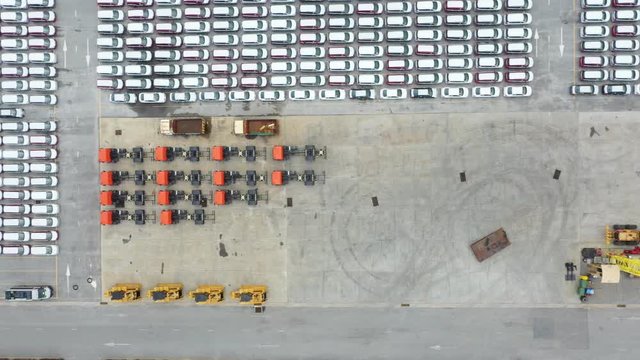 Aerial view cargo ship transportation of business logistic sea freight, New Cars produced by year up in the port for Cargo ship and Cargo import-export around in the world