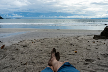Relaxing view of a person resting in the beach
