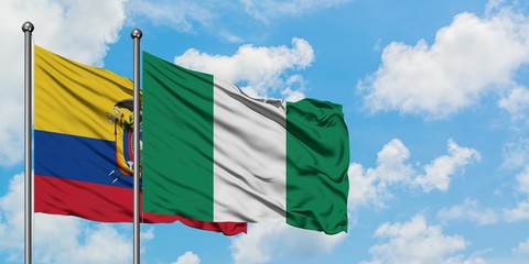 Ecuador and Nigeria flag waving in the wind against white cloudy blue sky together. Diplomacy concept, international relations.