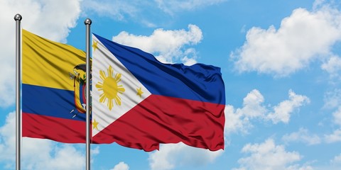 Ecuador and Philippines flag waving in the wind against white cloudy blue sky together. Diplomacy concept, international relations.