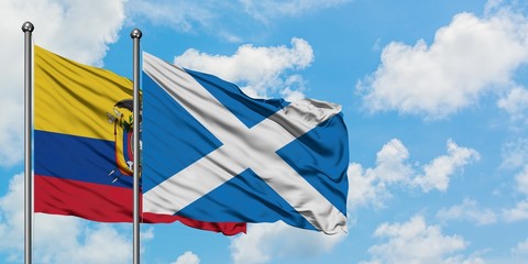 Ecuador and Scotland flag waving in the wind against white cloudy blue sky together. Diplomacy concept, international relations.