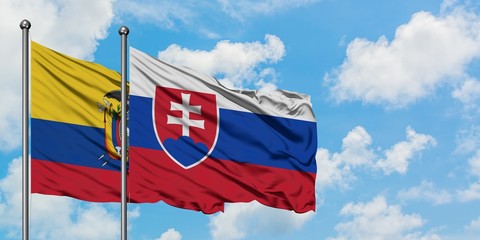 Ecuador and Slovakia flag waving in the wind against white cloudy blue sky together. Diplomacy concept, international relations.