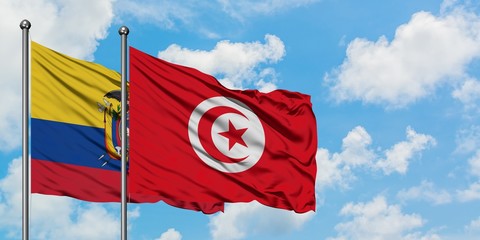 Ecuador and Tunisia flag waving in the wind against white cloudy blue sky together. Diplomacy concept, international relations.