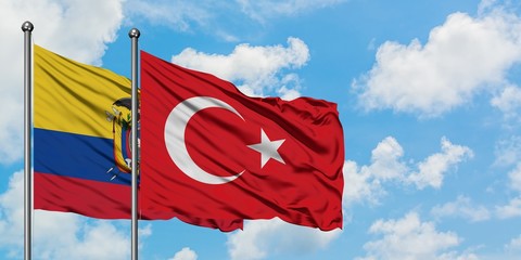 Ecuador and Turkey flag waving in the wind against white cloudy blue sky together. Diplomacy concept, international relations.