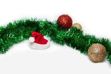 the inscription consists of Christmas beads with tinsel Santa hat and Christmas toys on a white...