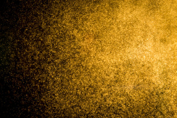 Abtract gold bokeh on black