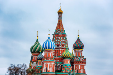 Fototapeta na wymiar Beautiful view of St. Basil's Cathedral on Red Square on a cloudy day. Close-up.