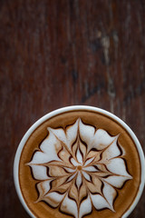 Cup of coffee with  latte art on top