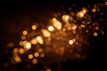 Gold abstract bokeh on black