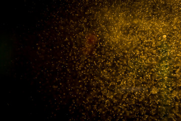 Abtract gold bokeh on black