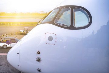 Cockpit view of modern airplane is parking at an airport before pilot and passenger come.
