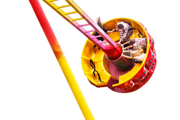 Pendulum swing ride in an amusement park and a cabin with cheerful children tends high to the...