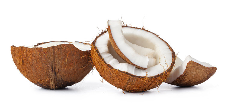 close up of a coconut craked into pieces