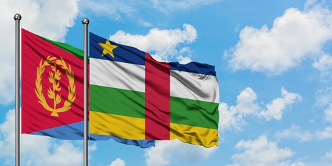 Eritrea and Central African Republic flag waving in the wind against white cloudy blue sky together. Diplomacy concept, international relations.