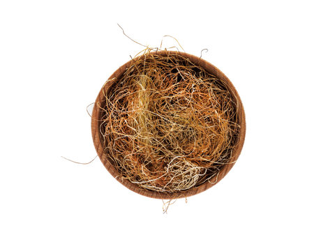 Dry Corn Stigmas in wooden Cup on white background