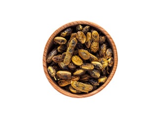Fruit of Styphnolobium japonicum in a wooden Cup on a white background