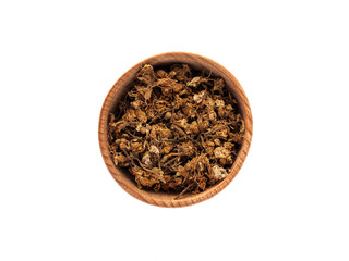 Dry flowers of Castanea or chestnut in a wooden Cup on a white background