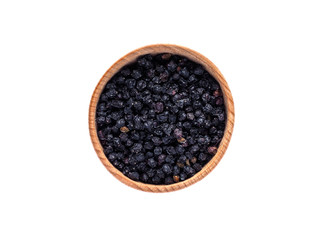 Fototapeta na wymiar Dried Sambucus berries in wooden Cup on white background