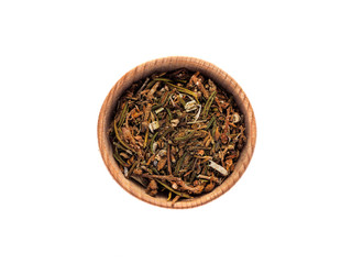 Dry bagulnik in a wooden Cup on a white background