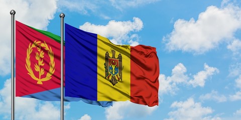 Eritrea and Moldova flag waving in the wind against white cloudy blue sky together. Diplomacy concept, international relations.