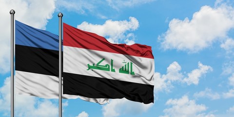 Estonia and Iraq flag waving in the wind against white cloudy blue sky together. Diplomacy concept, international relations.
