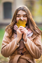 stylish woman in autumn park