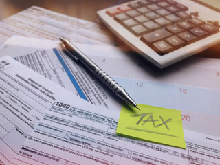 Fototapeta premium Annual tax filing is an important job and serious for company's accountants. Must do a regular job plan to prepare and submit documents to the supervisory and accounting control unit within deadline.