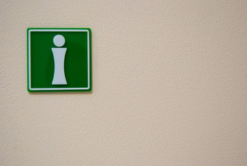 Green information sign on a light background