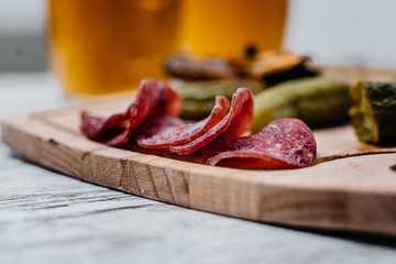 beer snacks on a wooden Board