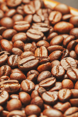 Roasted coffee beans, can be used as background. Soft contrast.