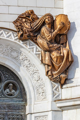 Obraz premium Figures of saints on the facade of Cathedral of Christ the Saviour. Cathedral of Christ the Saviour is a popular touristic landmark in Moscow historical center