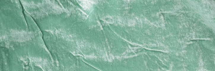 velvet texture pastel mint color background banner, expensive luxury fabric, wallpaper. copy space