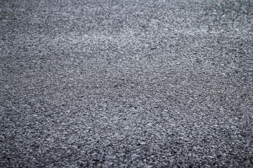 close up of new asphalt road texture with selective focus