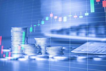 Stack of money coin with trading graph, financial investment concept use for background