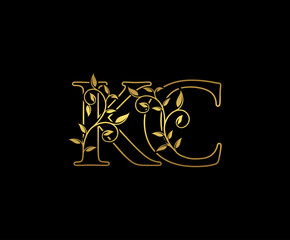 Classy letter K and C, KC vintage decorative ornament emblem badge, overlapping monogram logo, elegant luxury gold color on black background.