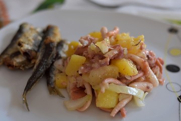 Octopus salad whit potatoes served at the plate/ Seafood/ Italian food