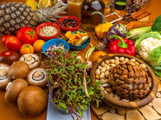 Mixed colorful foods, and pills, contains antioxidants, vitamins, fiber. Immune boosting products. Healthy clean concept. Superfoods