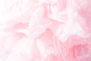 Pink crumpled paper for a wedding card. Crumpled pink paper texture.