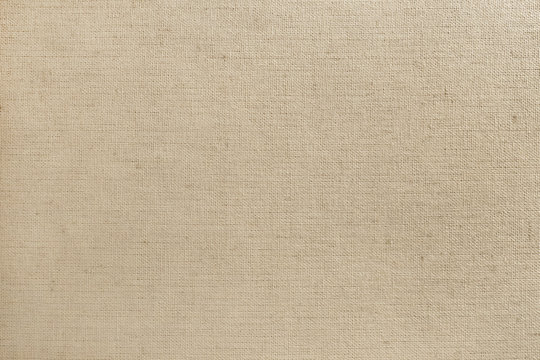 Brown cotton fabric texture background, seamless pattern of natural textile.