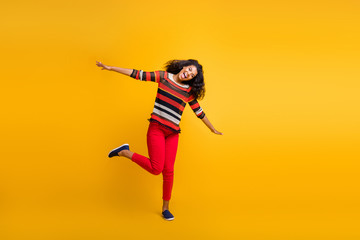 Full length photo of funky funny girl imagine she can fly like bird hold hands scream wear casual style sweater clothing isolated over bright color background