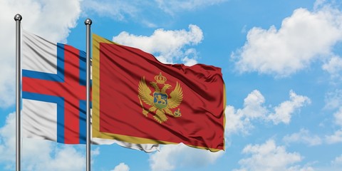 Faroe Islands and Montenegro flag waving in the wind against white cloudy blue sky together. Diplomacy concept, international relations.