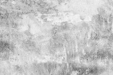 Texture of a concrete wall with cracks and scratches which can be used as a background